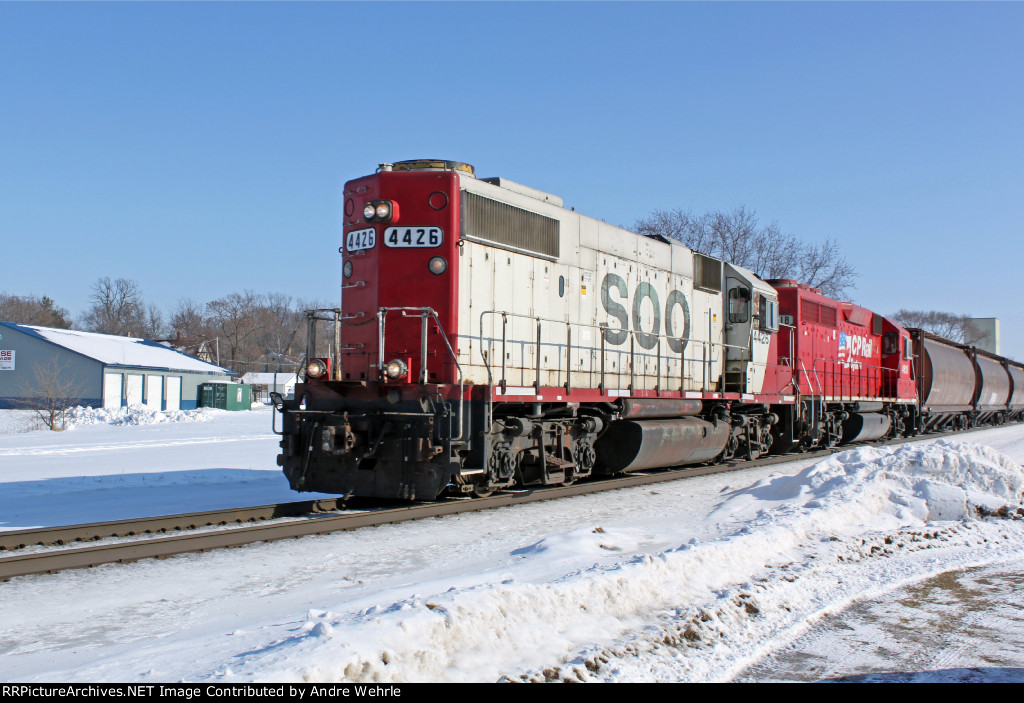 SOO 4426 leads CP 4618 and 9 covered hoppers